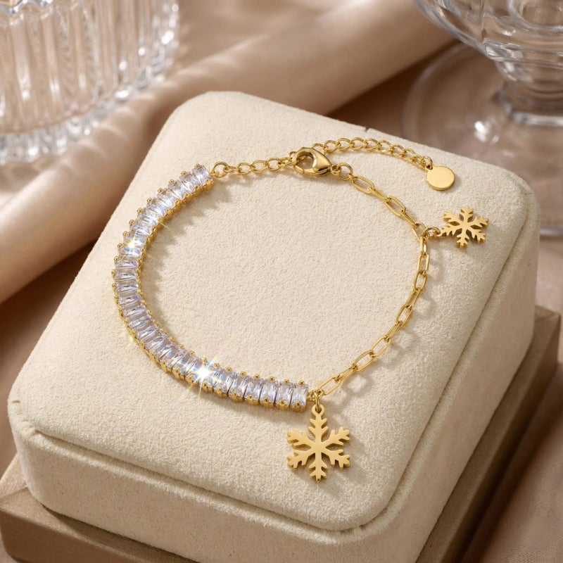 An elegant gold bracelet made of rust-resistant stainless steel, combining the sparkle of shiny zircon stones and delicate snowflake pendants, with an adjustable clasp to fit you. - Image 2